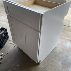 white shaker style base cabinet