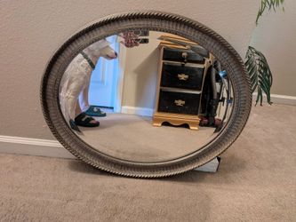 Oval wall mirror