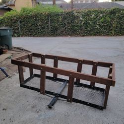 Hitch Mounted Cargo Carrier With Metal Mesh Frame Base And Built In Wooden Railing Enclosure