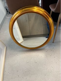 Antique brass mirror 24” in diameter