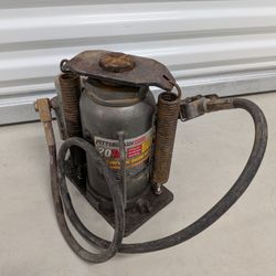 Pittsburgh Automotive 20-ton air/hydraulic bottle jack.
