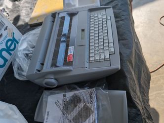 Sx-4000electricol LCD display typewriter with dictionary