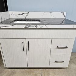 bathroom vanity with granite counter top, sink included 