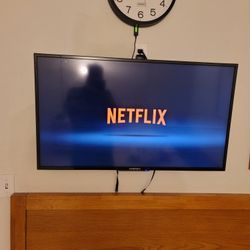 Three TVs, two 42 inches and one 58 inches, all smart and in excellent condition with remotes.