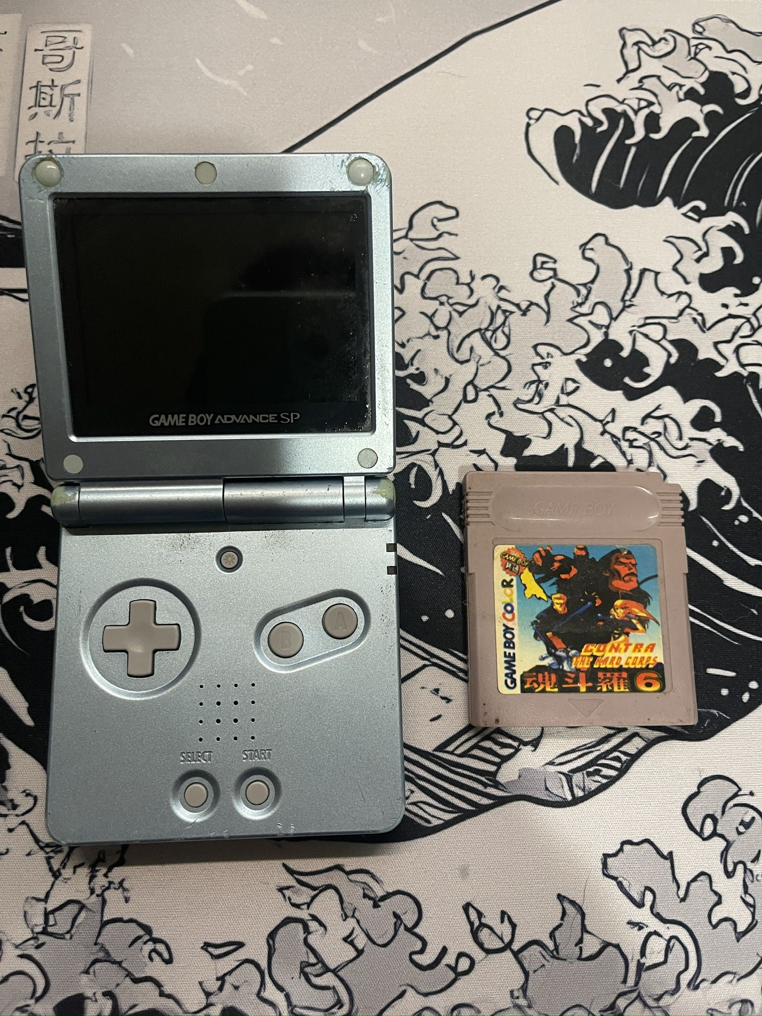 Gameboy Advance SP ( Pearl Blue )