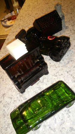4 vintage Avon bottles unused with the original aftershave inside