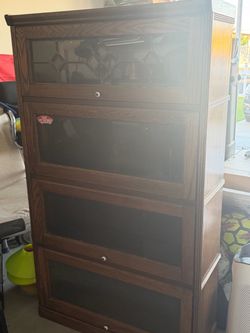 4door wooden bookcase with glass windows