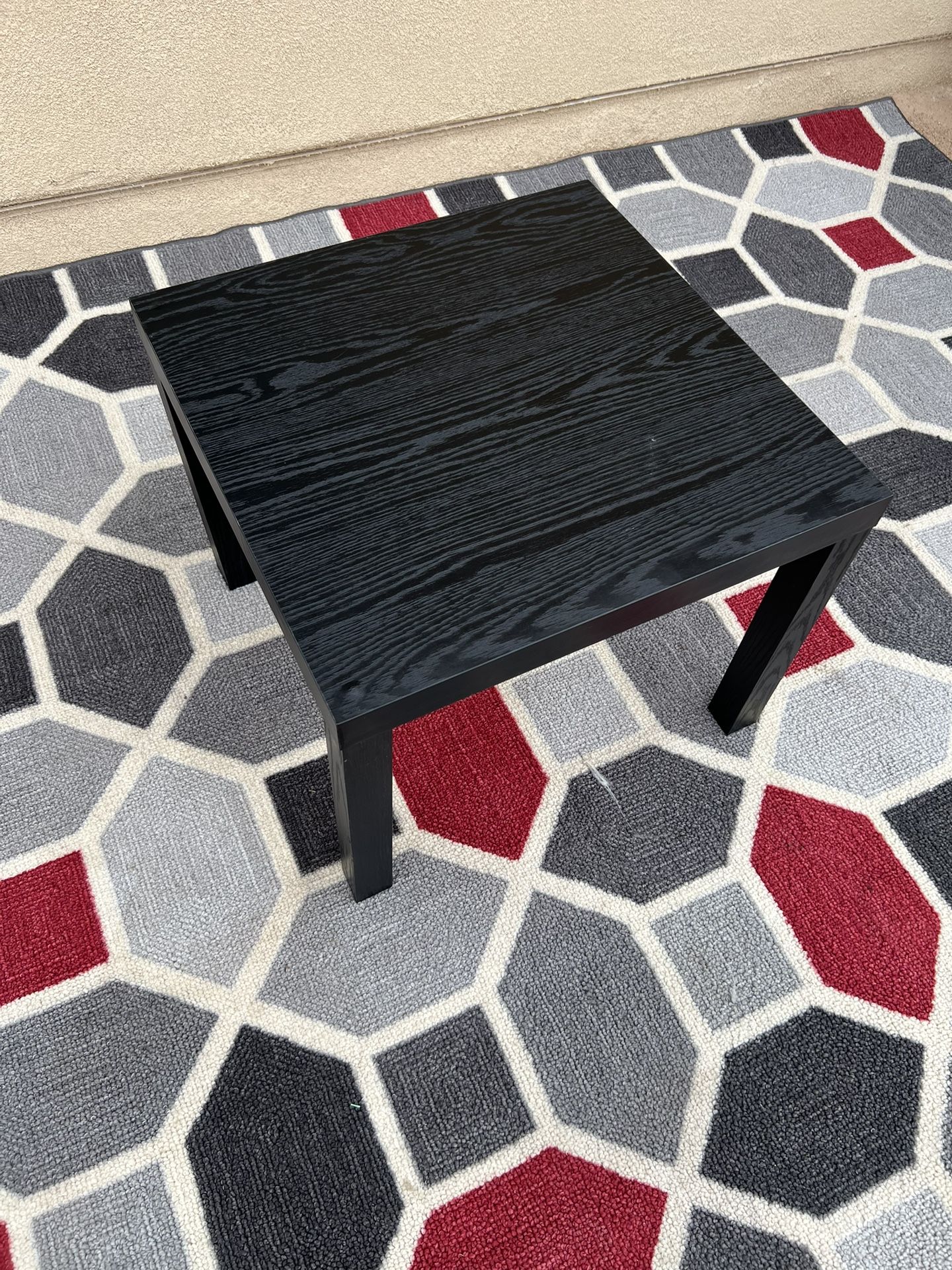 Black wooden end table