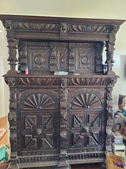 Beautiful hand carved solid oak cupboard/armoire