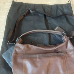 TUMI brown leather  shoulder bag with strap & handle several pockets zippers 