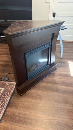 Corner electric fireplace - $25