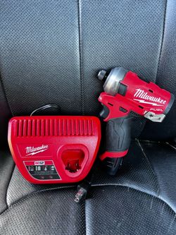 Milwaukee m12 fuel brushless surge imoact driver 3 speeds eith battery and charger