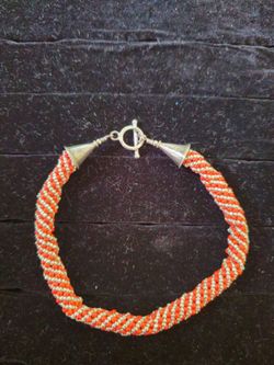 Coral and silver beads with sterling closure