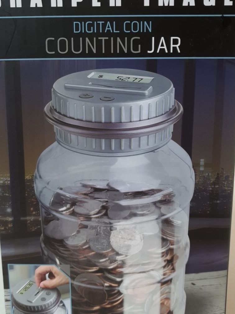 Sharper Image Digital Coin Counting Jar Piggy Bank. Condition is "New". Shipped with USPS First Class Package Mail . This is new, never used, still