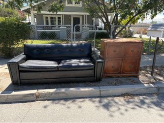 Couch and stereo cabinet with record player