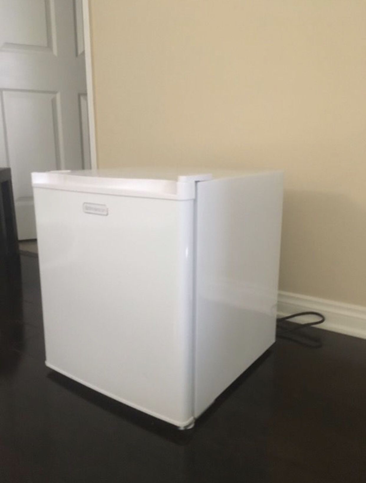 White mini fridge