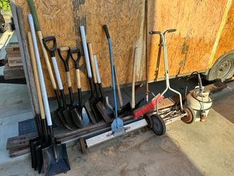 Yard tools shovels, axe, pick, 36in magnet, push mower, broom, propane torch with tank $100 for all or will sell separately for more