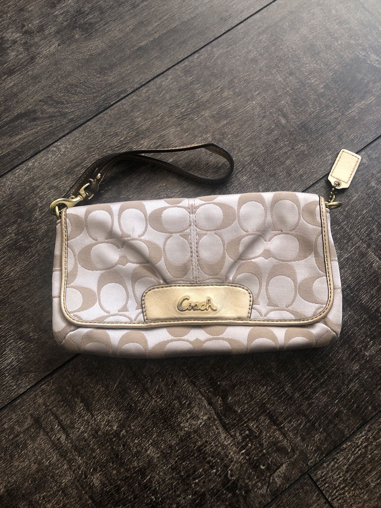 Coach Wristlet Tan with Pink colors