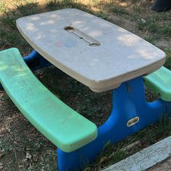 Outside Kids Toys And Bikes And Tables 