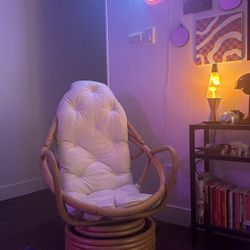 Vintage rattan swivel accent chair