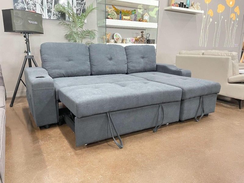 BRAND NEW SECTIONAL SLEEPER COUCH IN ORIGINAL BOX