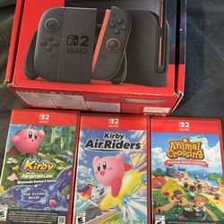 Nintendo switch 2 + 3 games with carrying case and extra grips