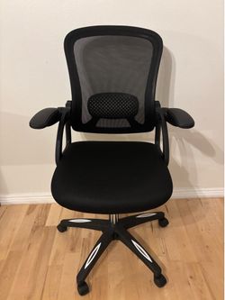 Black Mesh Office Chair with Flip Up Arms