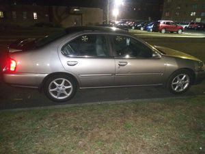 Photo 2000 nissan altima low miles ,4 cylinder car is in good condition sun roof ac and heat works perfect . i have another car and don't need this one