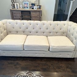 Beige linen chesterfield sofa and two chairs