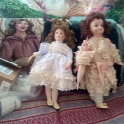 Porcelain Doll. 1 On The Left