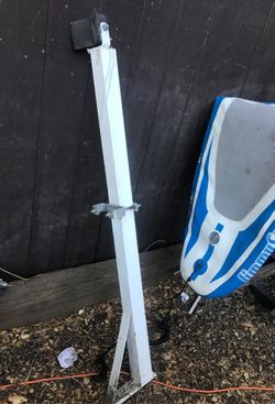 Sailboat mast holder for trailer
