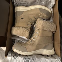 Ugg tan winter fur boots size 8.