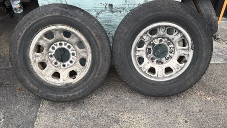 Two 8x180mm 18 Inch stock Steel wheels with old tires Chevrolet or GMC Trucks from 2011 Or newer