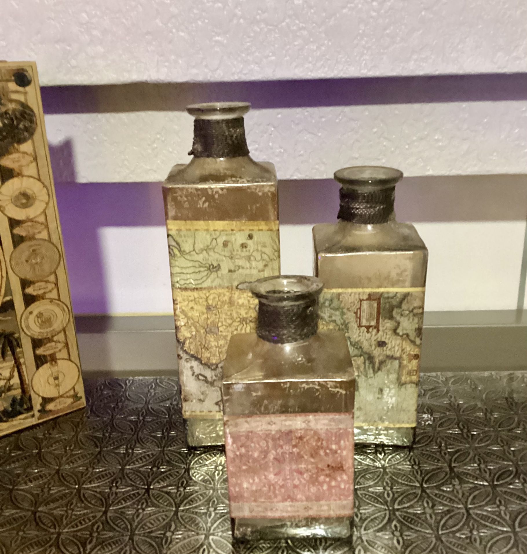 Antique Cosina Map Bottles