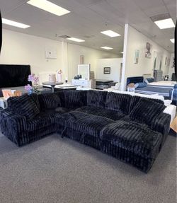 Black corduroy sleeper sectional u shaped with storage chaise