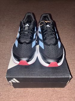 Size 10.5, men’s brand new unworn Adidas shoes with tags and box