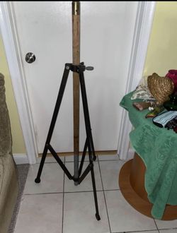Metal Tripod with wood and brass pole $40