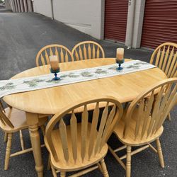 Wooden table and six chairs