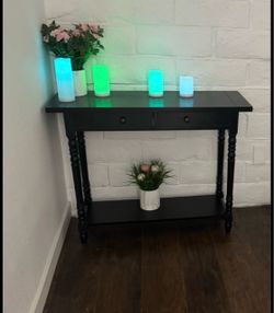 Black console table —Accessories not included