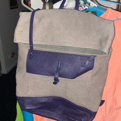Beigh And Brown With Leather Trimmer All Around The Too And Bottom Of Bag. With Back Strip Book Bag. Heavy . 
