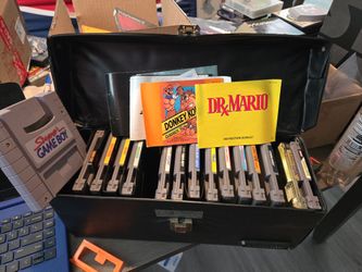 NES COLLECTION W/MANUALS & CASE