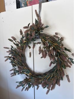 18” round feathered wreath