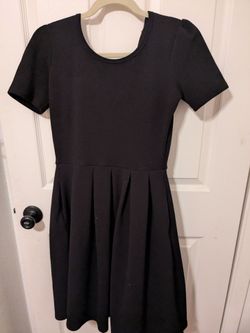 Women's black dress with pockets
