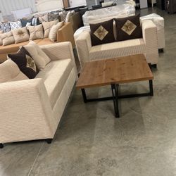 Sofa loveseat and cocktail table and end table $1088 cocktail table 2 end tables sofa and loveseat all five pieces