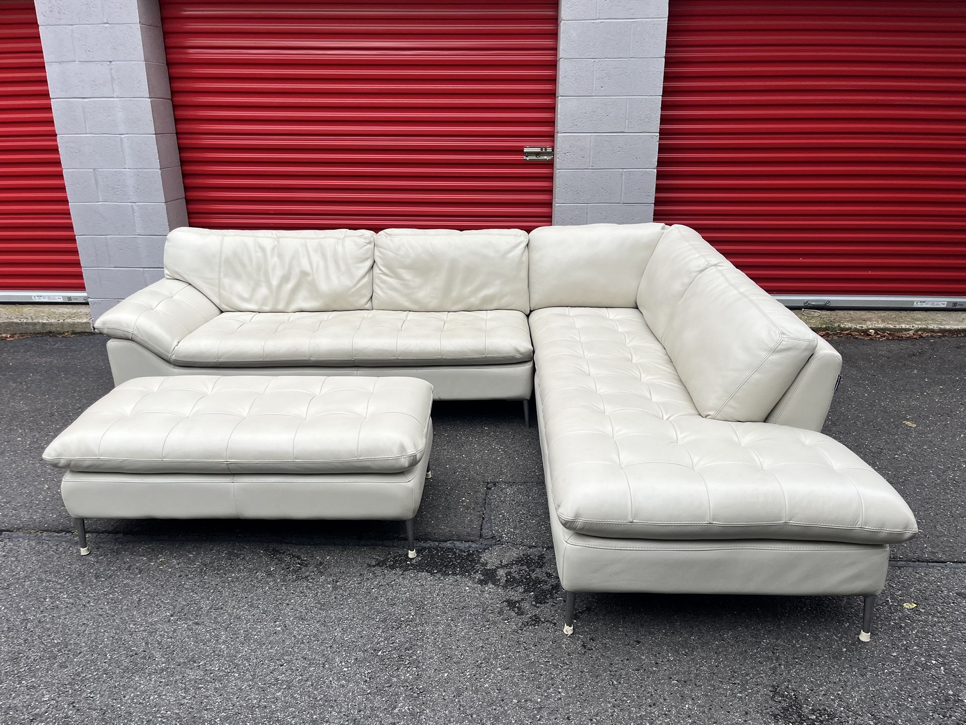 Chateau D’ax White Leather Sectional With Ottoman