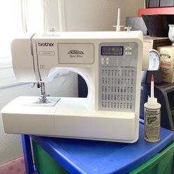 Brother Project Runway Limited Edition Sewing Machine + Extras (Sewing Machine Oil, Rotary Cutter, Mini Scissors)