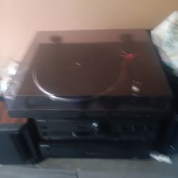  Denon DP-300F Fully Automatic Turntable. Key features of the turntable include: 