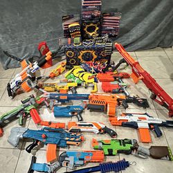 NERF GUNS and lots of Bullets 