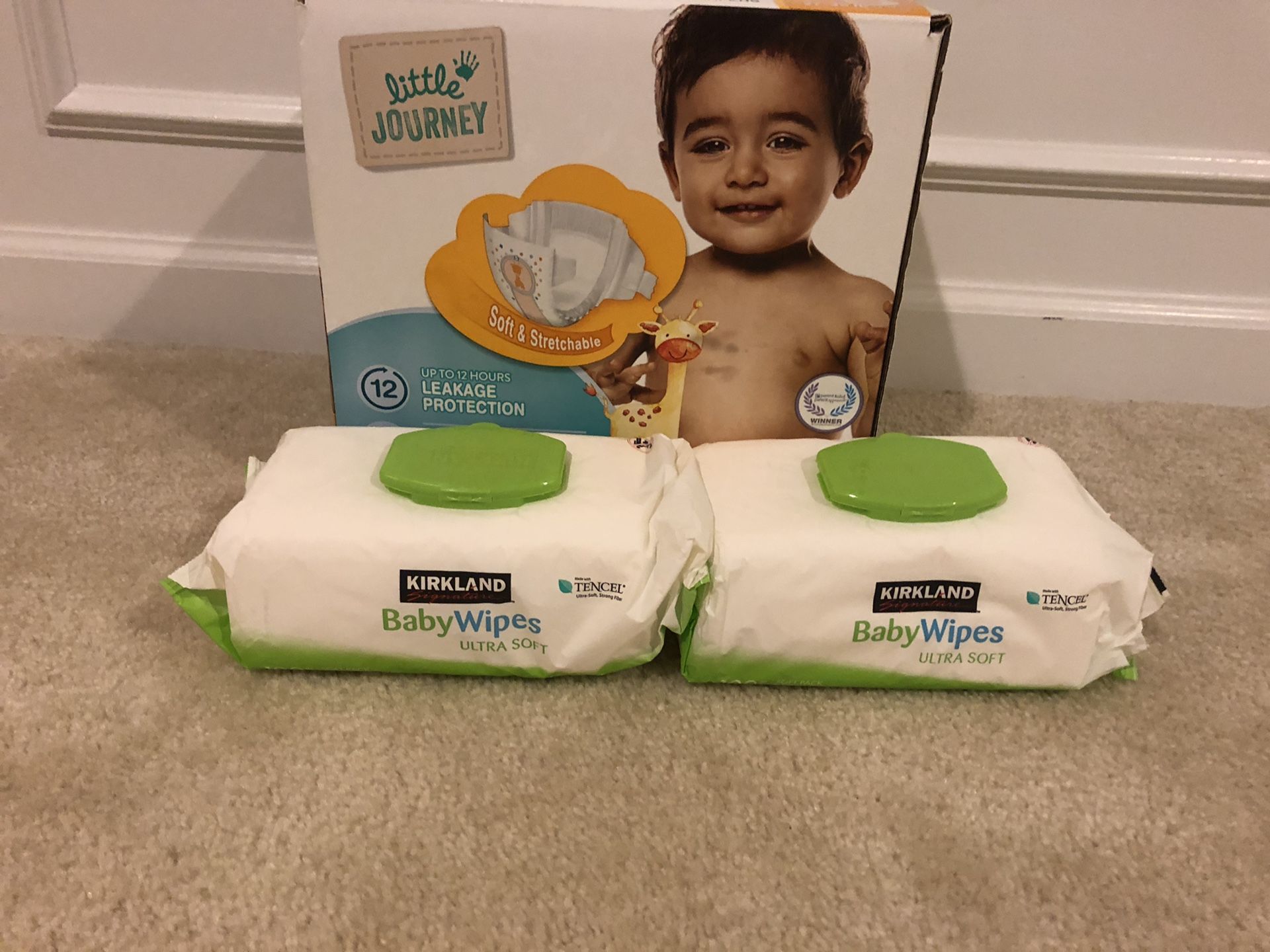 70 diapers size 5 ( unopened box) with 2 boxes of baby wipes