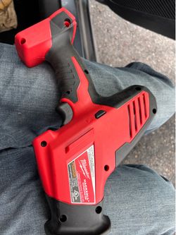 Milwaukee multitool and hacksaw